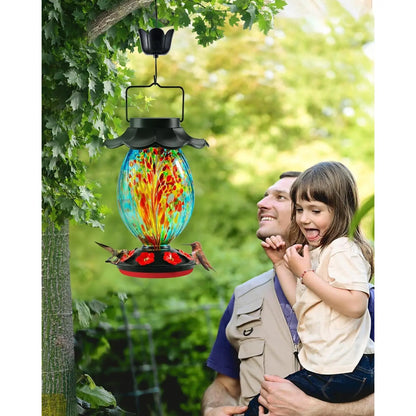 Solar Hummingbird Feeder - 49 Fl.Oz Hand Blown Glass Color Changing - 7 Feeding Ports with Perch - Never Leak - Hummingbird Feeder for Outdoors Hanging (Blue)